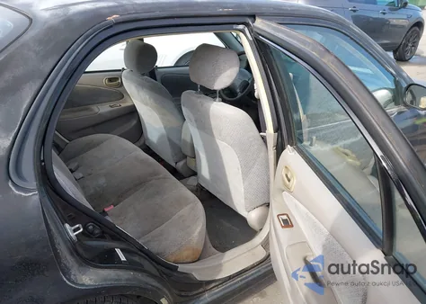 1999 Toyota Corolla Ce z USA, uszkodzony, nr VIN 2T1BR12E8XC103647